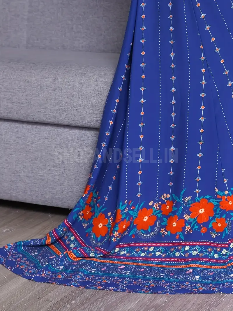 Elegant Blue Bohemian Maxi Dress with Intricate Embroidery